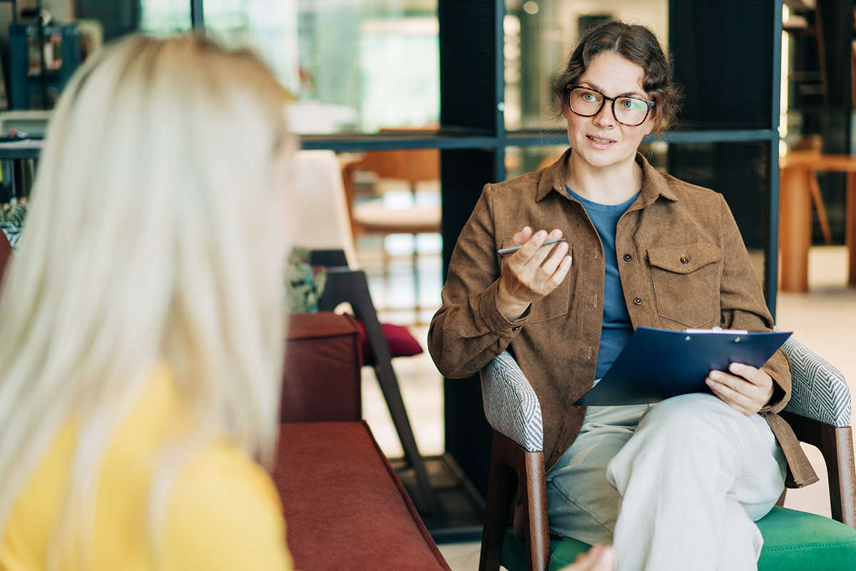Mental health therapist meeting one-on-one with a client during an individual counseling session.